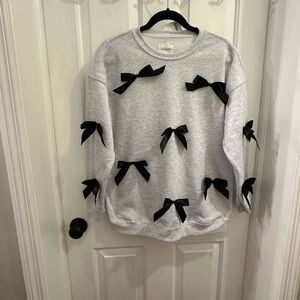 Gray Sweatshirt with Black Bows